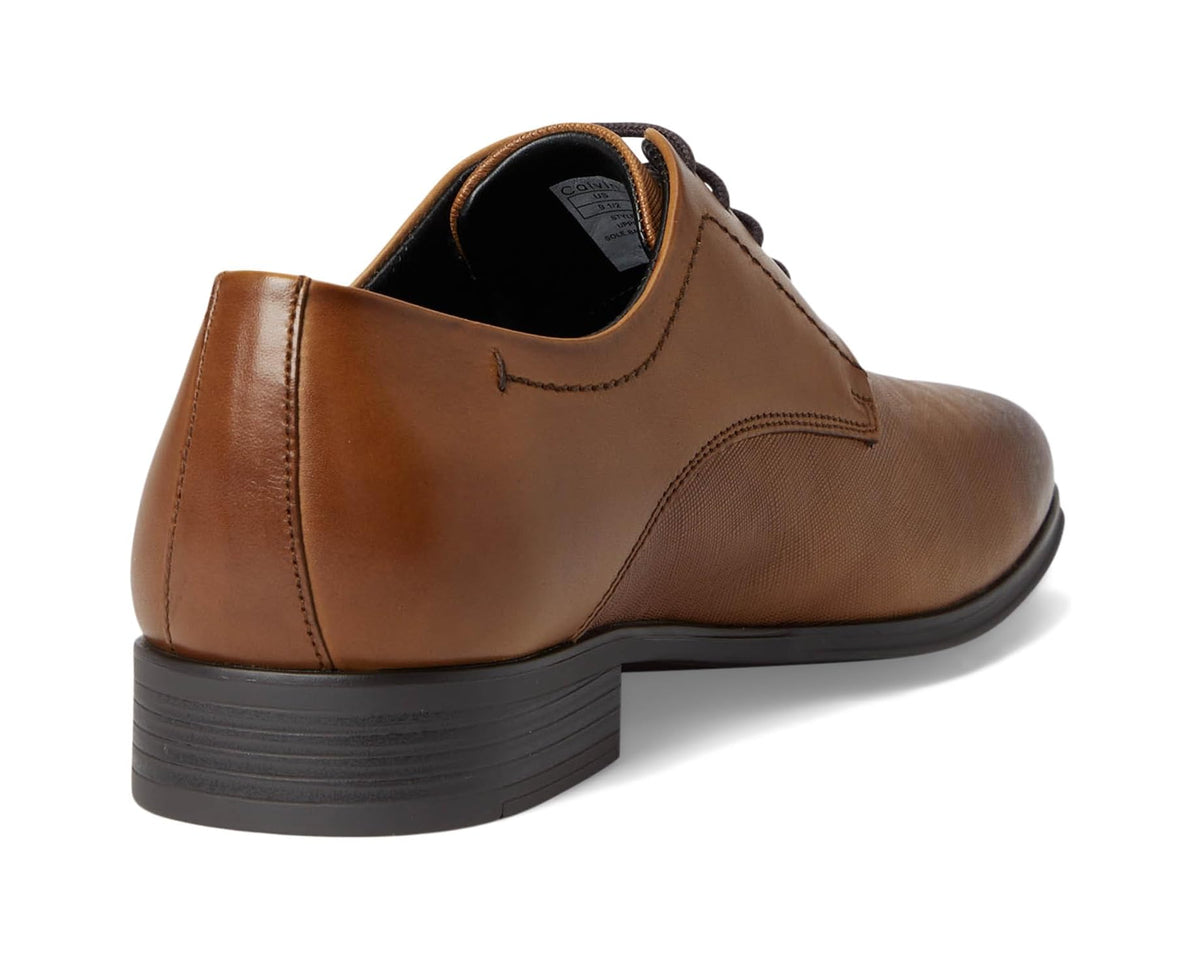 Men's medium brown leather lace-up shoe with cushioned collar and dark outsole