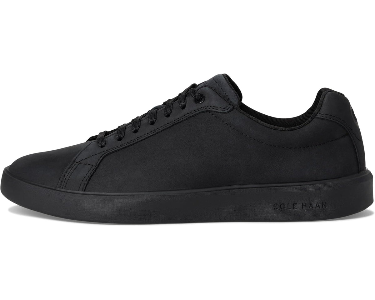 Black nubuck low-top sneakers with lace-up front and stitched side panels