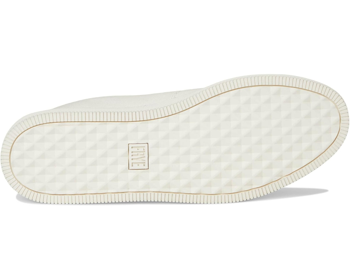 White sneaker outsole with textured rubber tread and side label