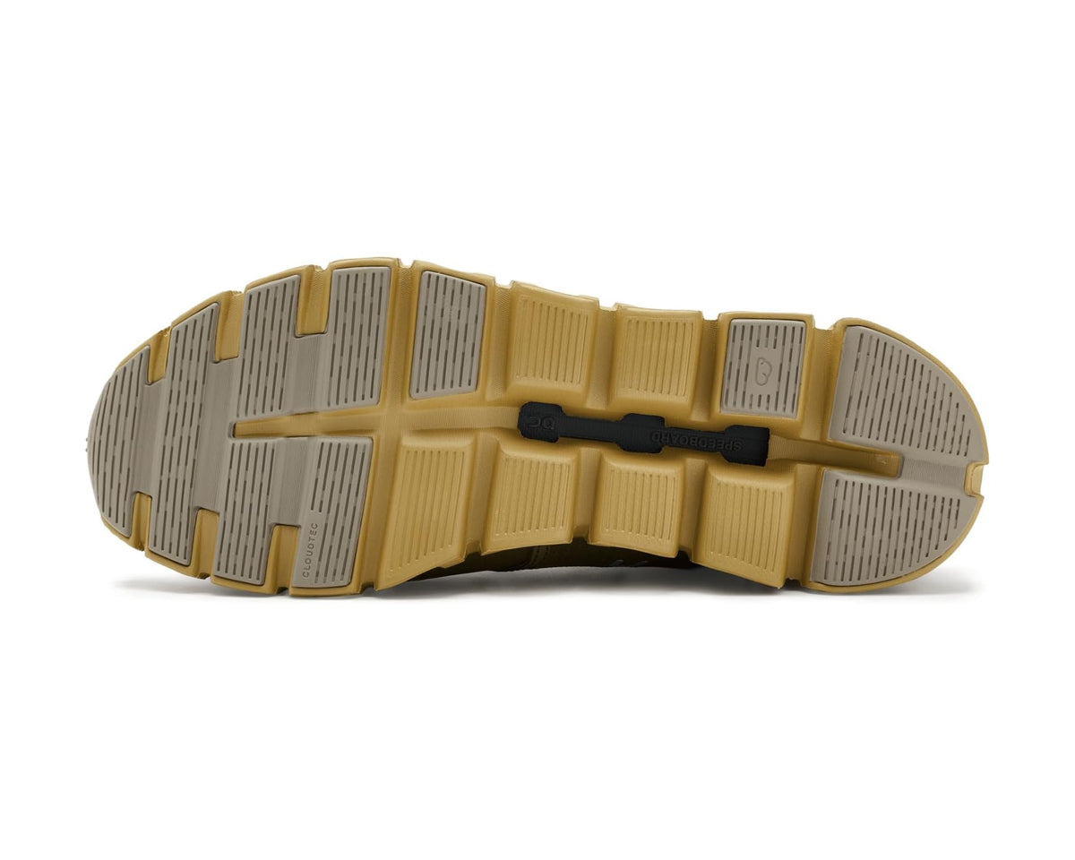 Outsole of men's waterproof olive running shoe with tread and segmented pods