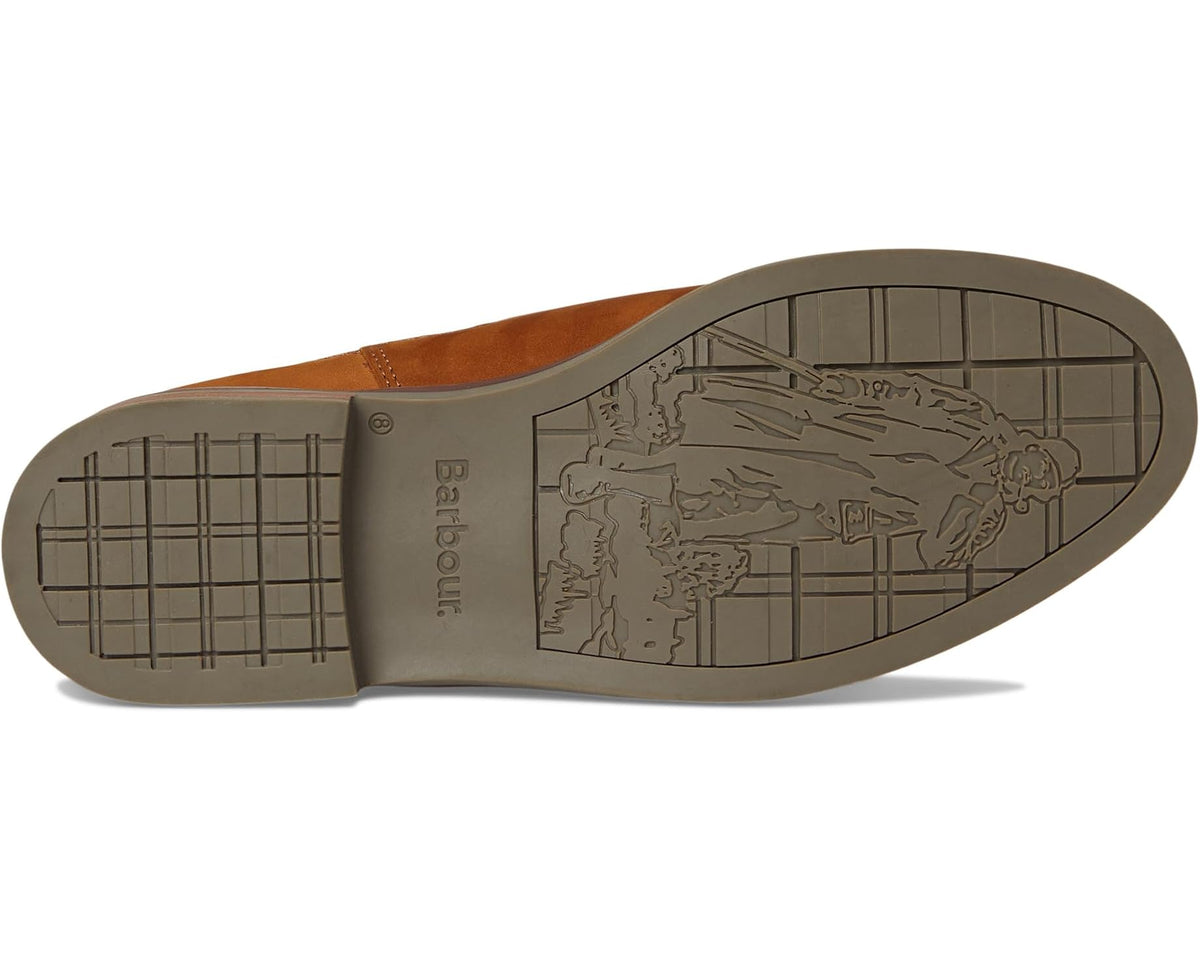 Dark tan Chelsea boot outsole with embossed Barbour graphic and traction tread