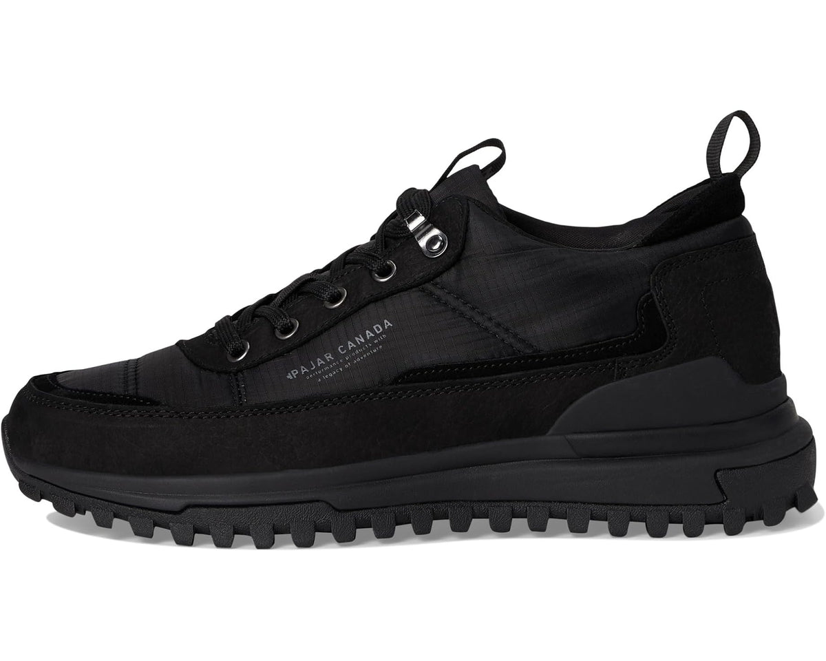 Fero Low sneaker side view in black with lace-up eyelets and logo patch
