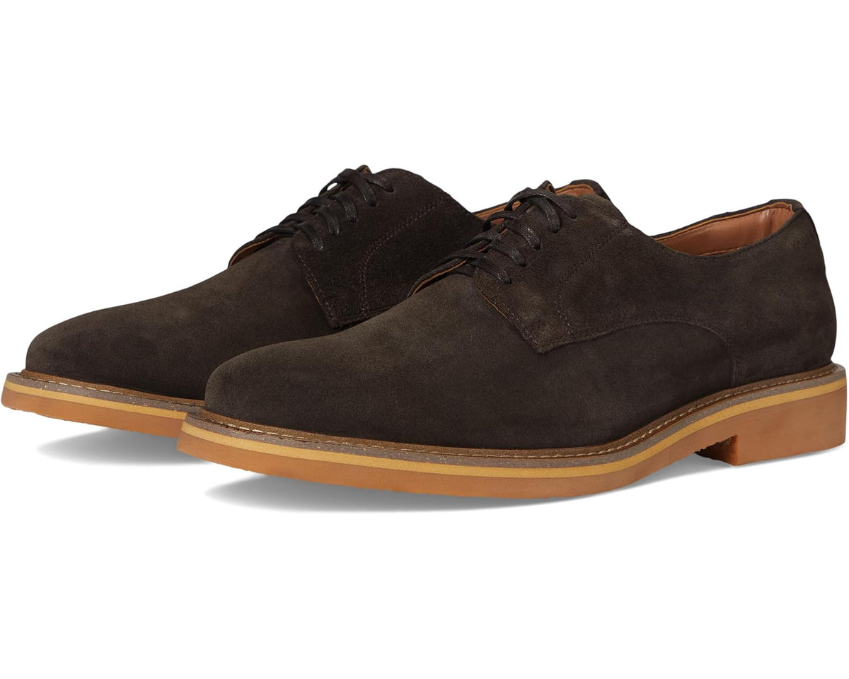 Brown suede men’s lace-up oxford with tan rubber sole and stitched welt.