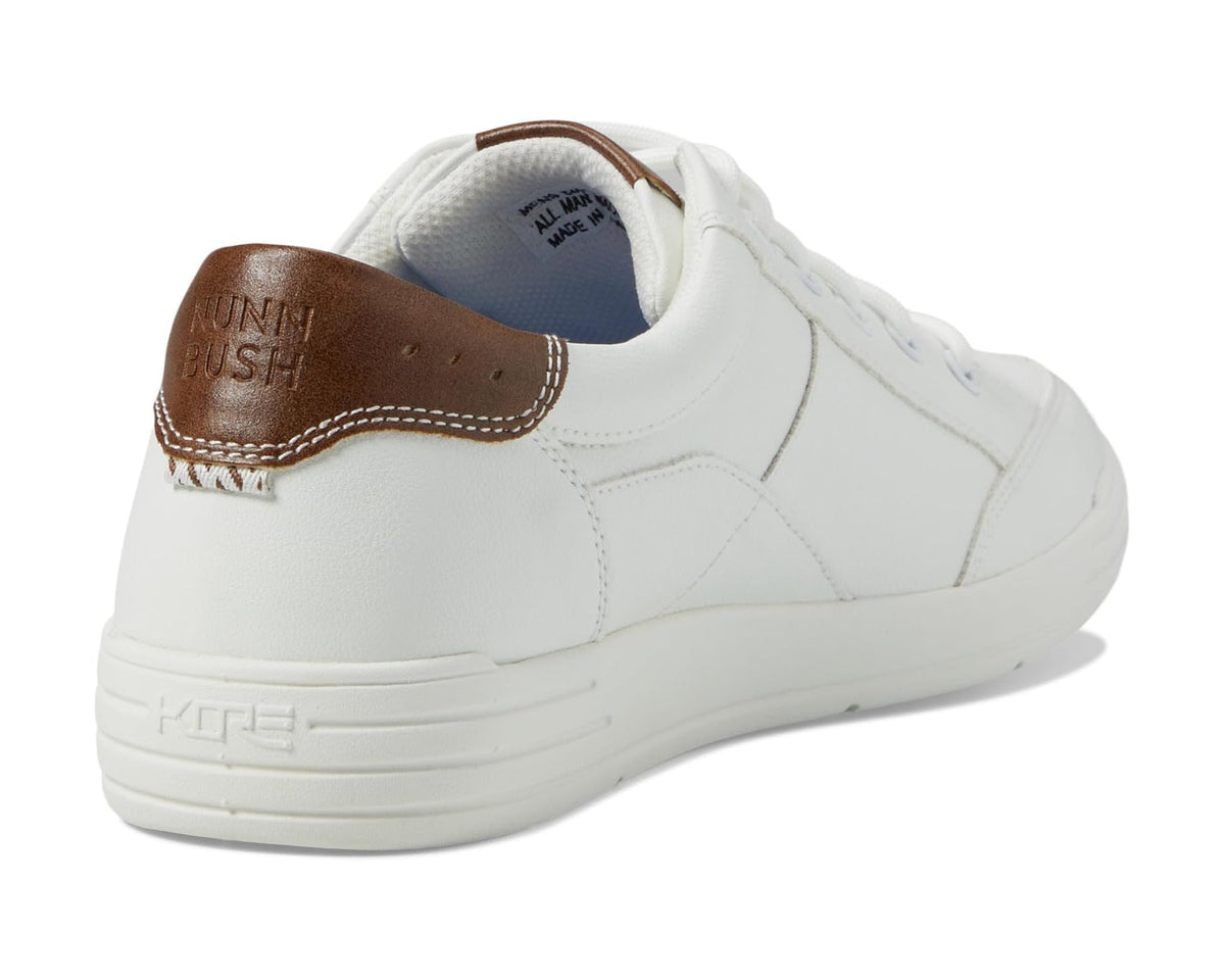 Men's white sneaker with brown leather heel patch and heel pull tab