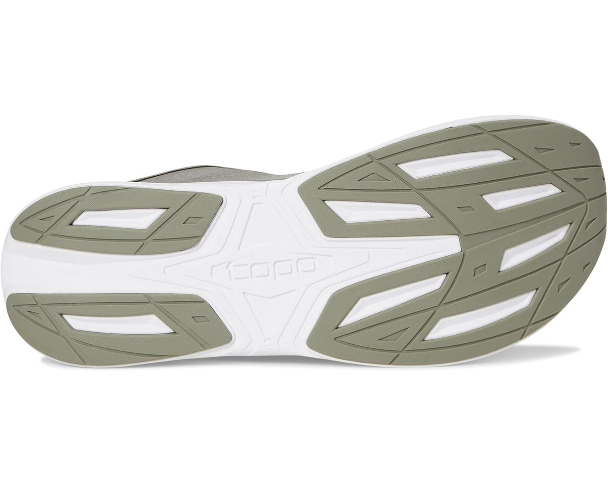 White and khaki running shoe outsole with tread patterns