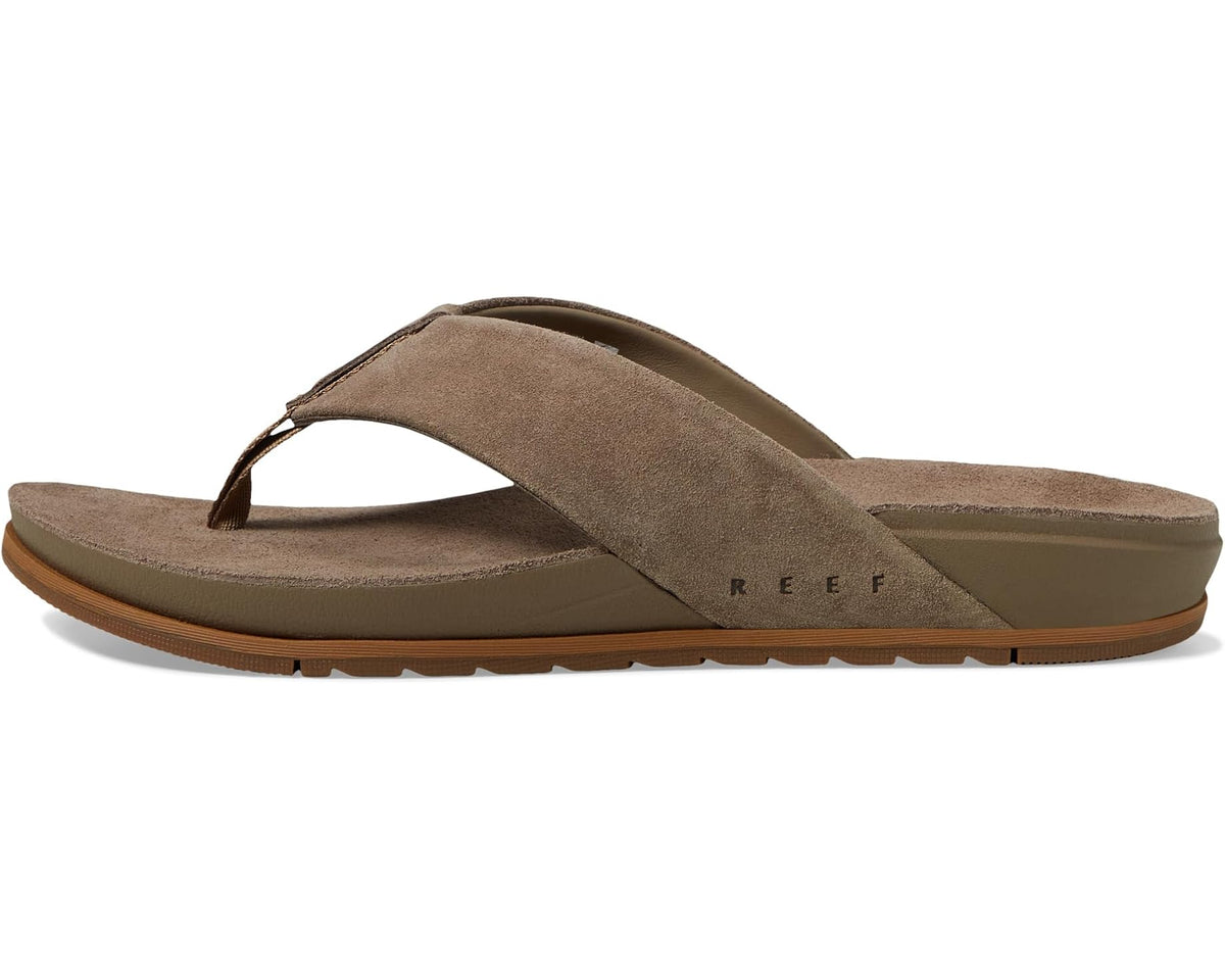 Men's suede flip-flop sandals in fossil brown, side view with thong strap