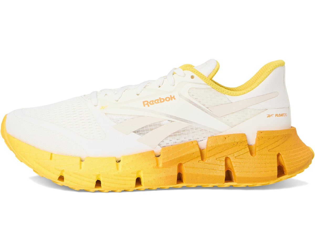 Men's white and yellow lace-up running shoe with logo accents and chunky sole