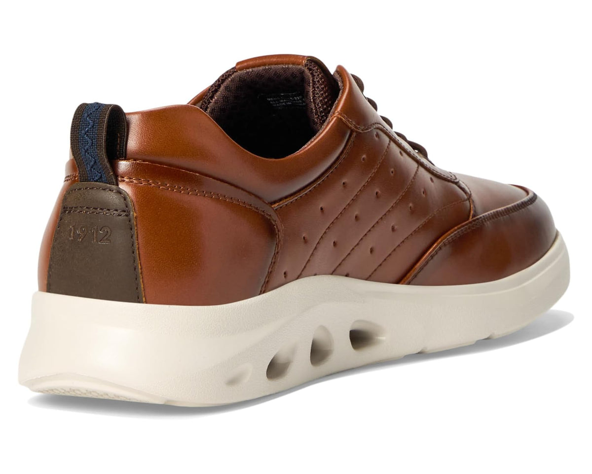 Men's Nunn Bush cognac sneakers with padded collar and heel tab marked 1912