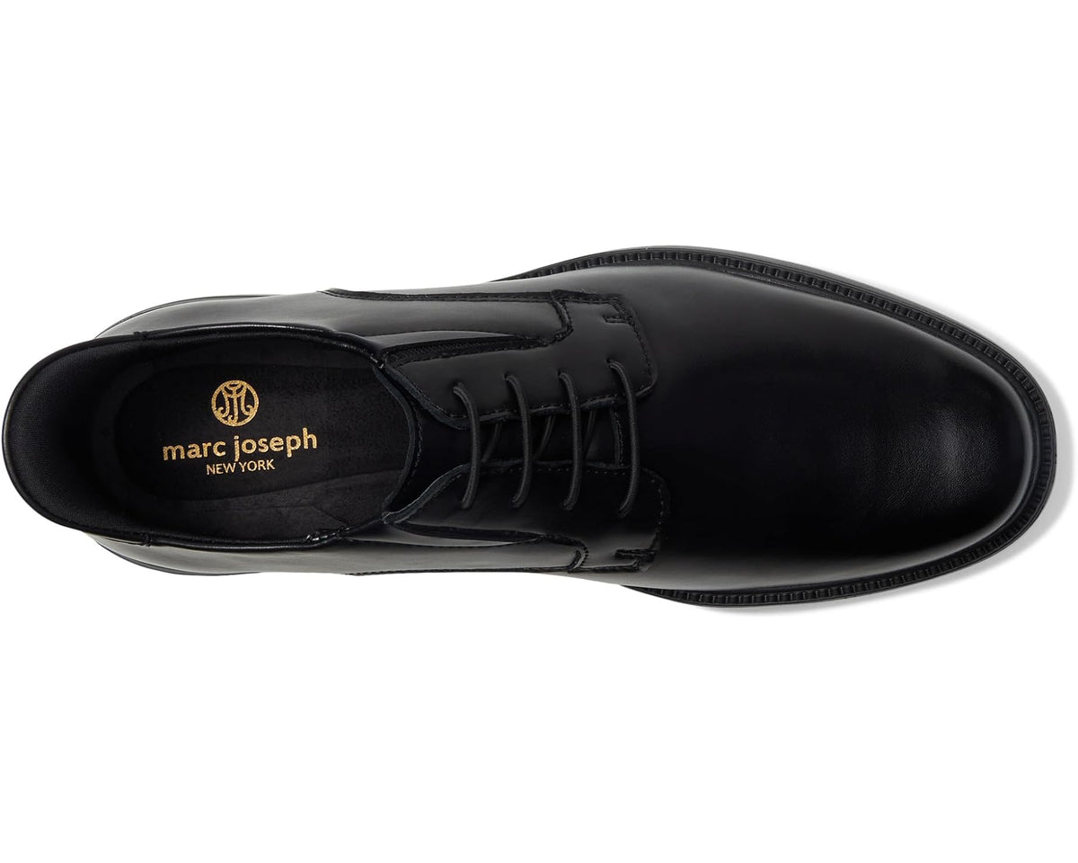 Black men's leather lace-up oxford shoe, side view with brand logo on tongue