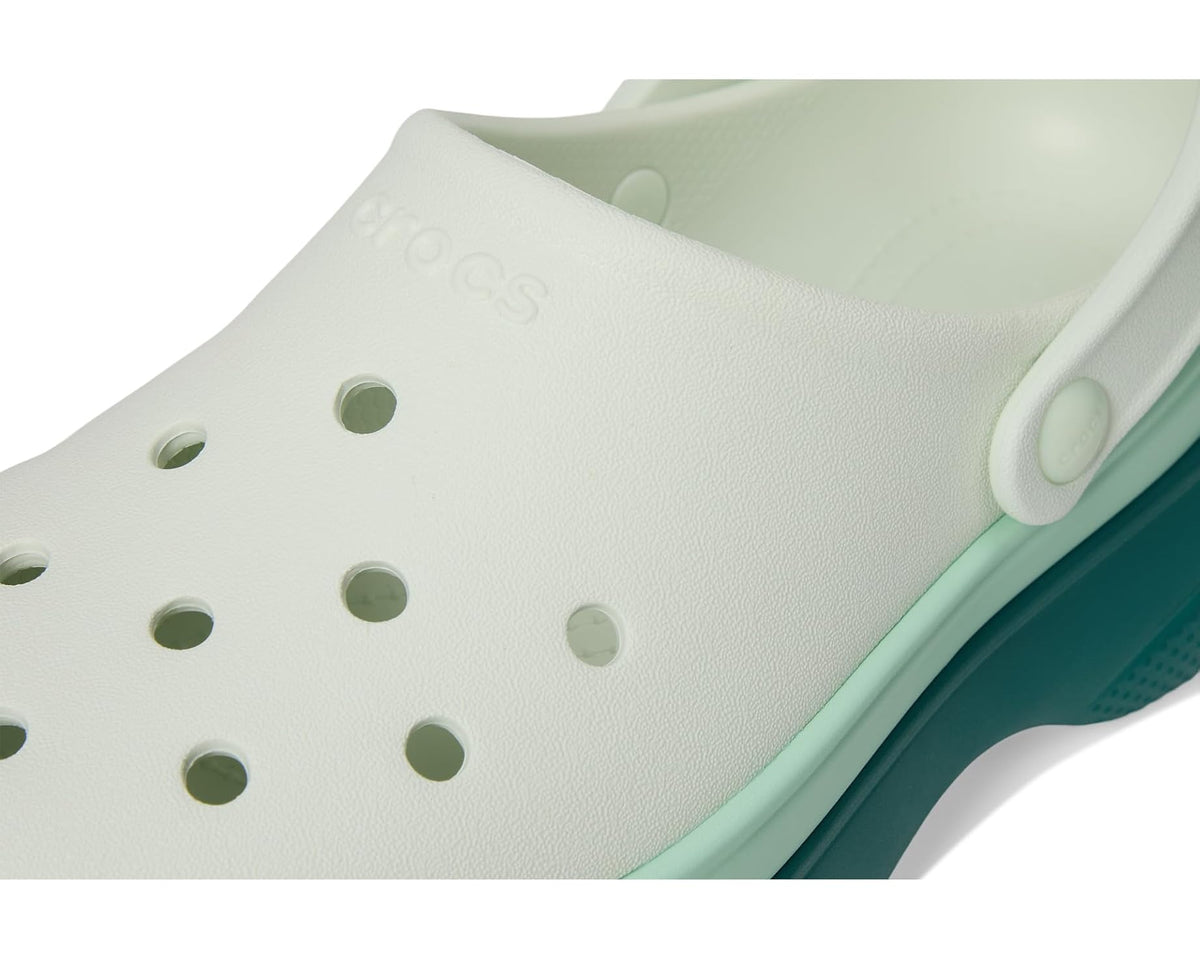 Crocs unisex Hosta platform clog, close-up of white upper and green trim