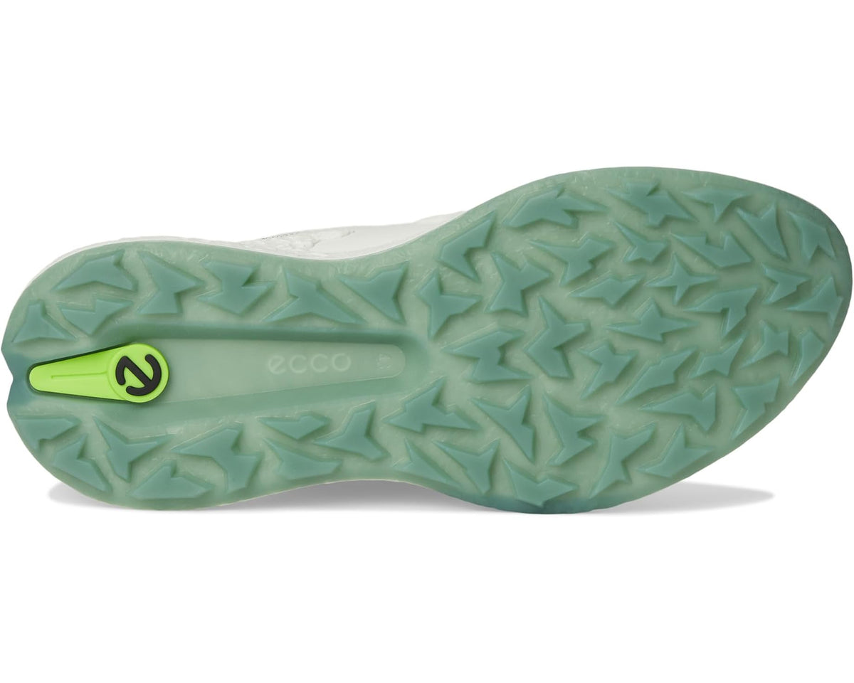 White waterproof golf shoe outsole with green traction lugs and ECCO logo