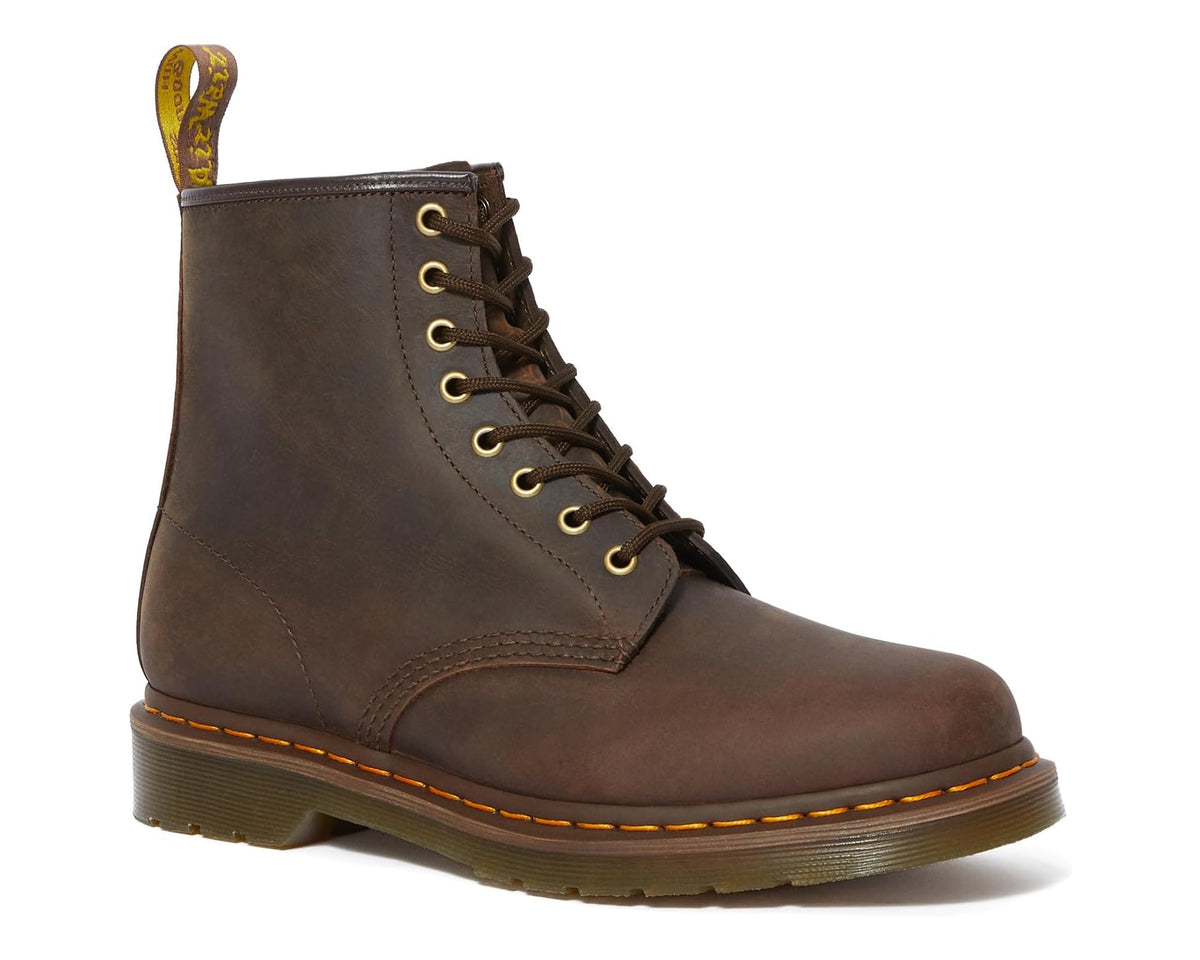 Dark brown lace-up leather ankle boots with yellow laces, welt stitching, and sole