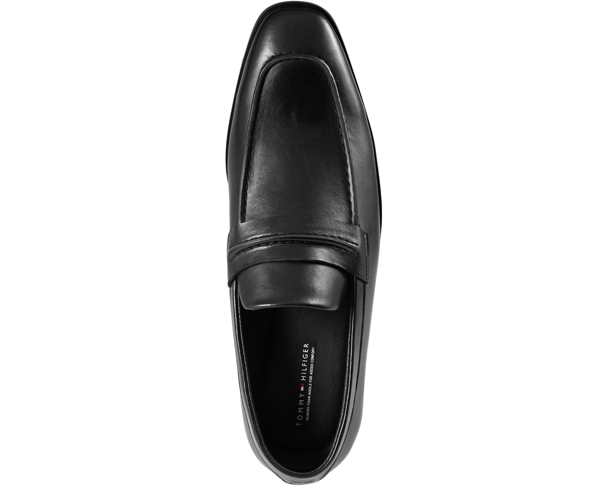 Black leather loafer side view with slip-on opening