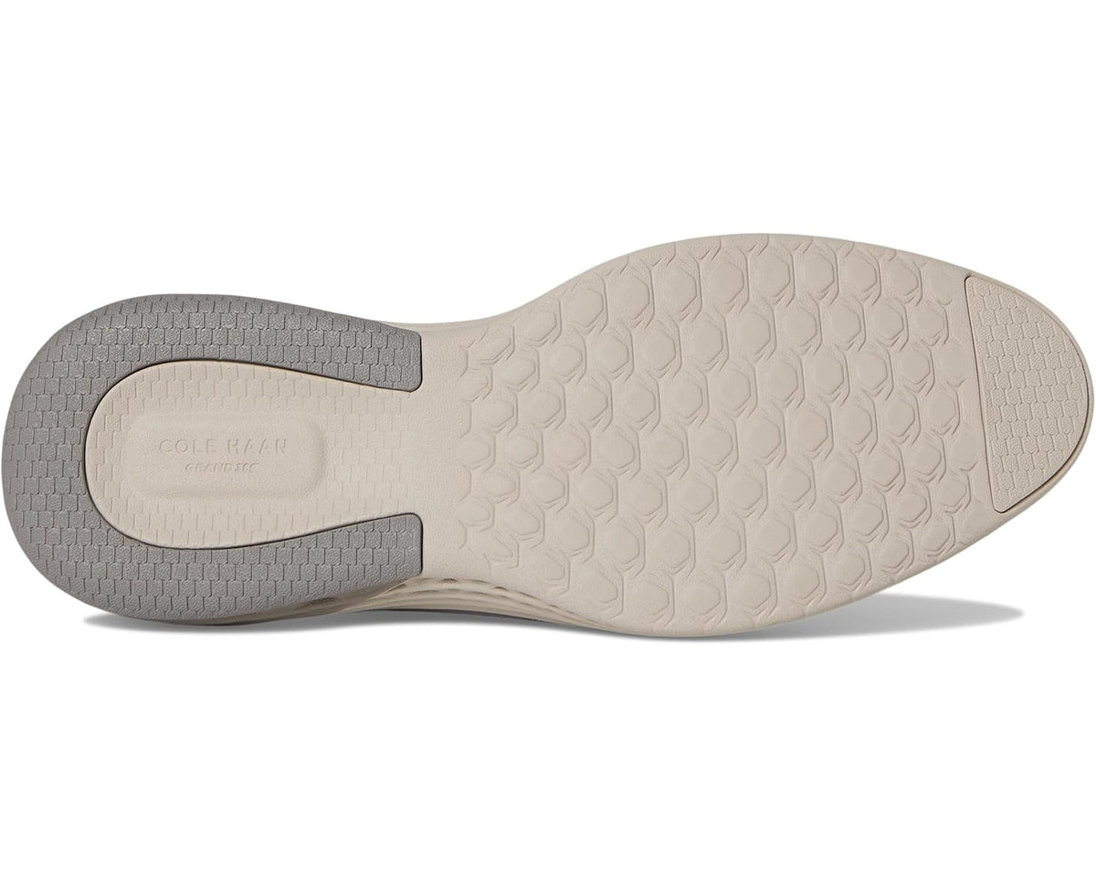 Men's Cole Haan oxford outsole with textured rubber tread and light beige heel area