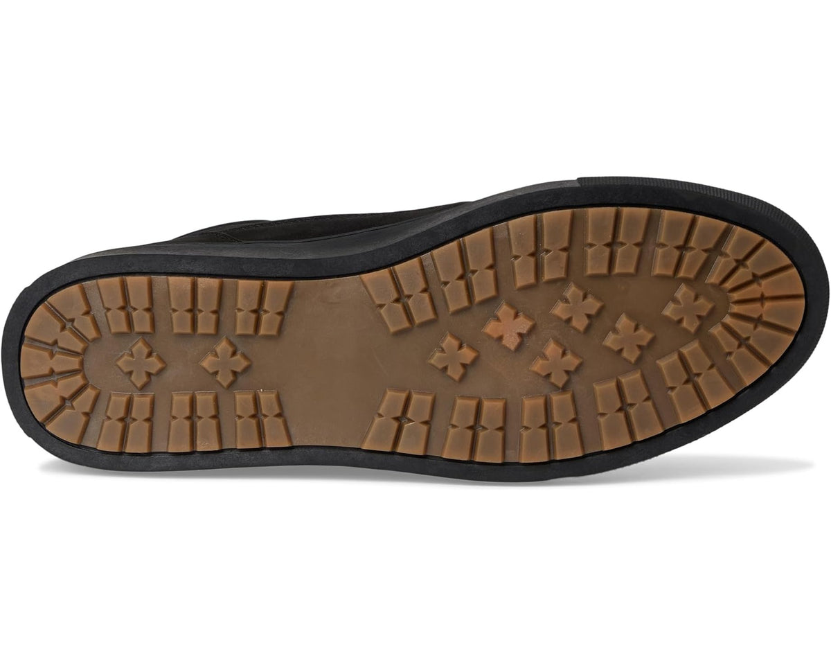 Sanuk black high-top shoe outsole with brown rugged tread pattern