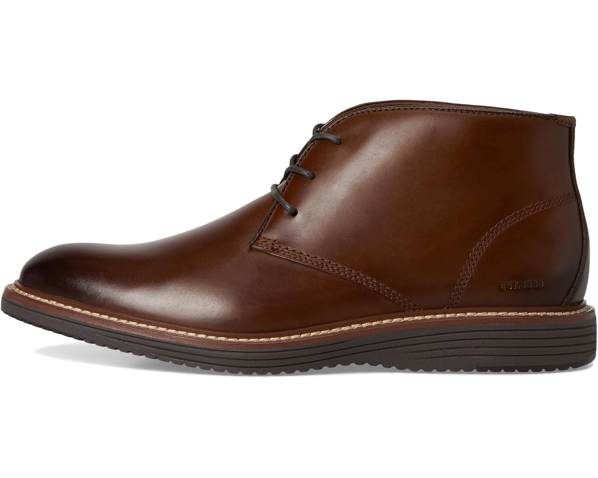Tan leather chukka boot, lace-up ankle height, welt stitch detail