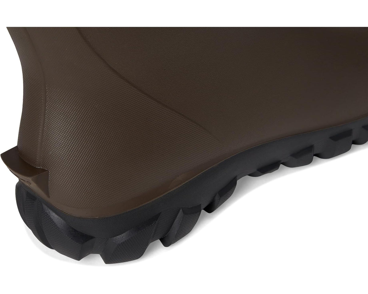 Brown boot heel with textured upper and deep lug rubber outsole