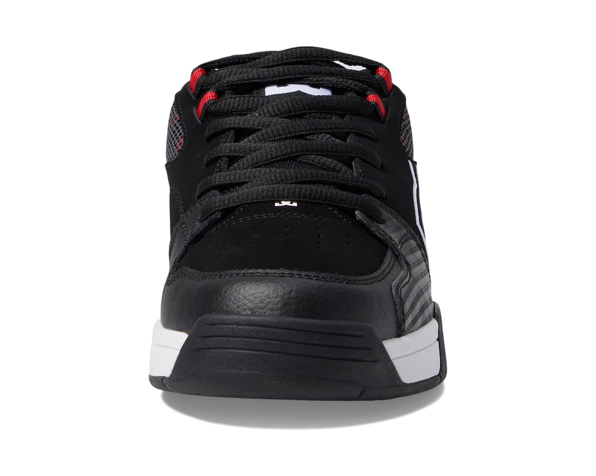 Black DC skate sneakers with lace-up front and cushioned midfoot sole.