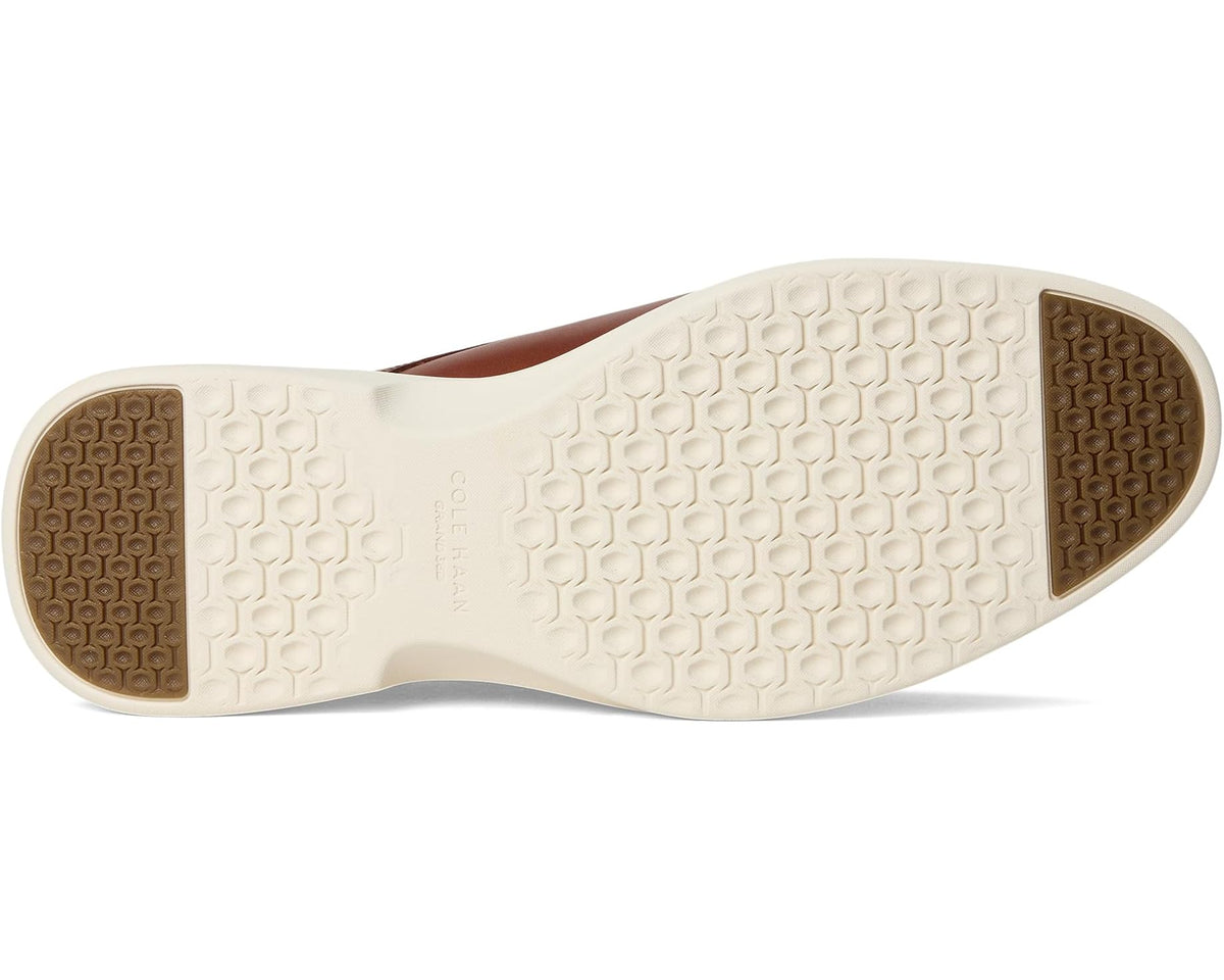 Cream outsole with textured tread and dark heel panel