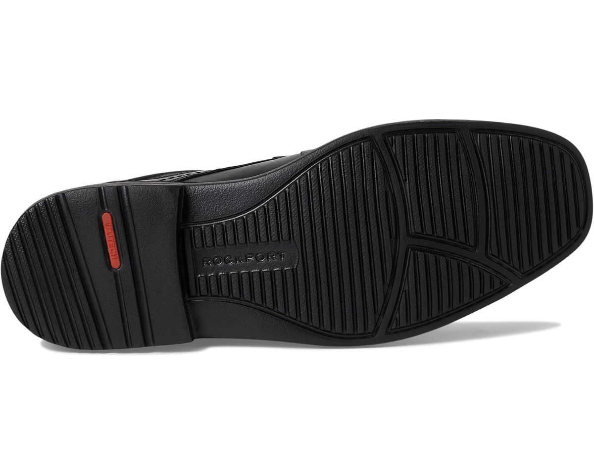 Black rubber sole with ribbed traction and Rockport TrueTech logo