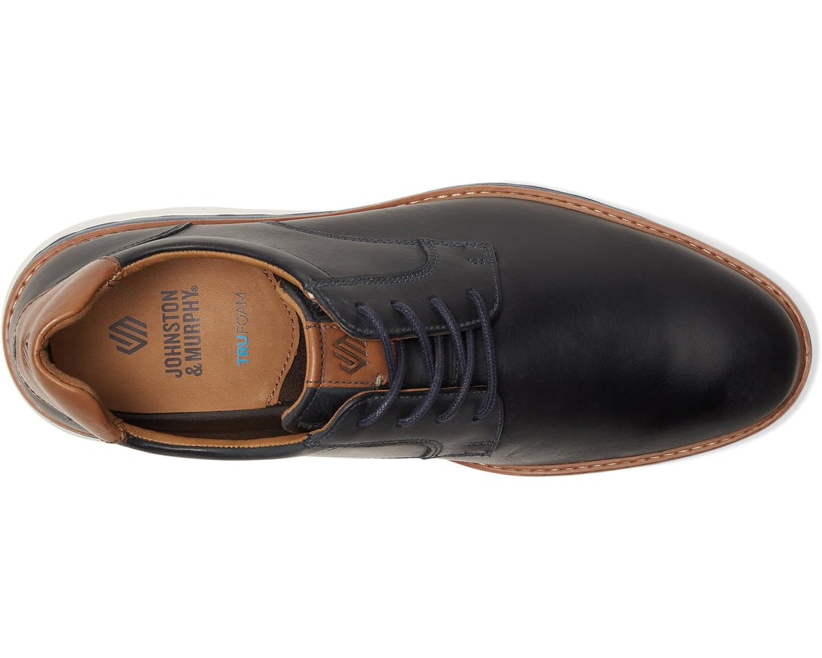 Men's lace-up shoe with plain toe, dark navy upper and tan-lined interior