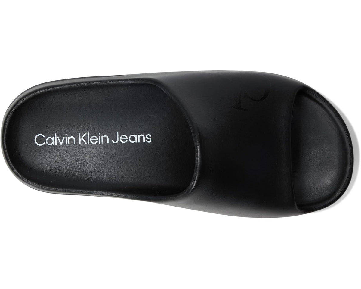 Black Calvin Klein Jeans slide sandal with logo footbed and wide strap