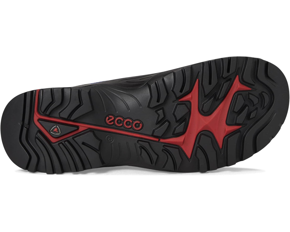 Hiking shoe outsole with deep tread and black rubber sole, red accent