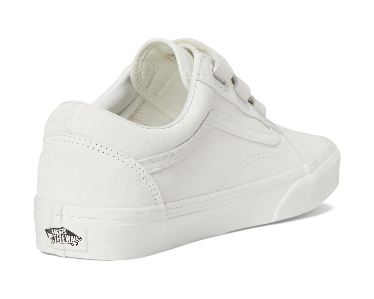 White low-top sneakers with cushioned collar and Vans heel label