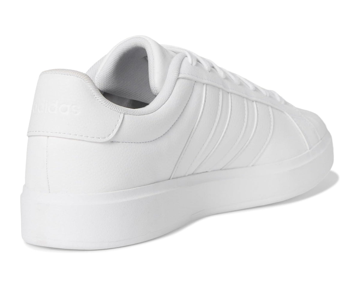 White adidas sneakers with padded collar and heel tab