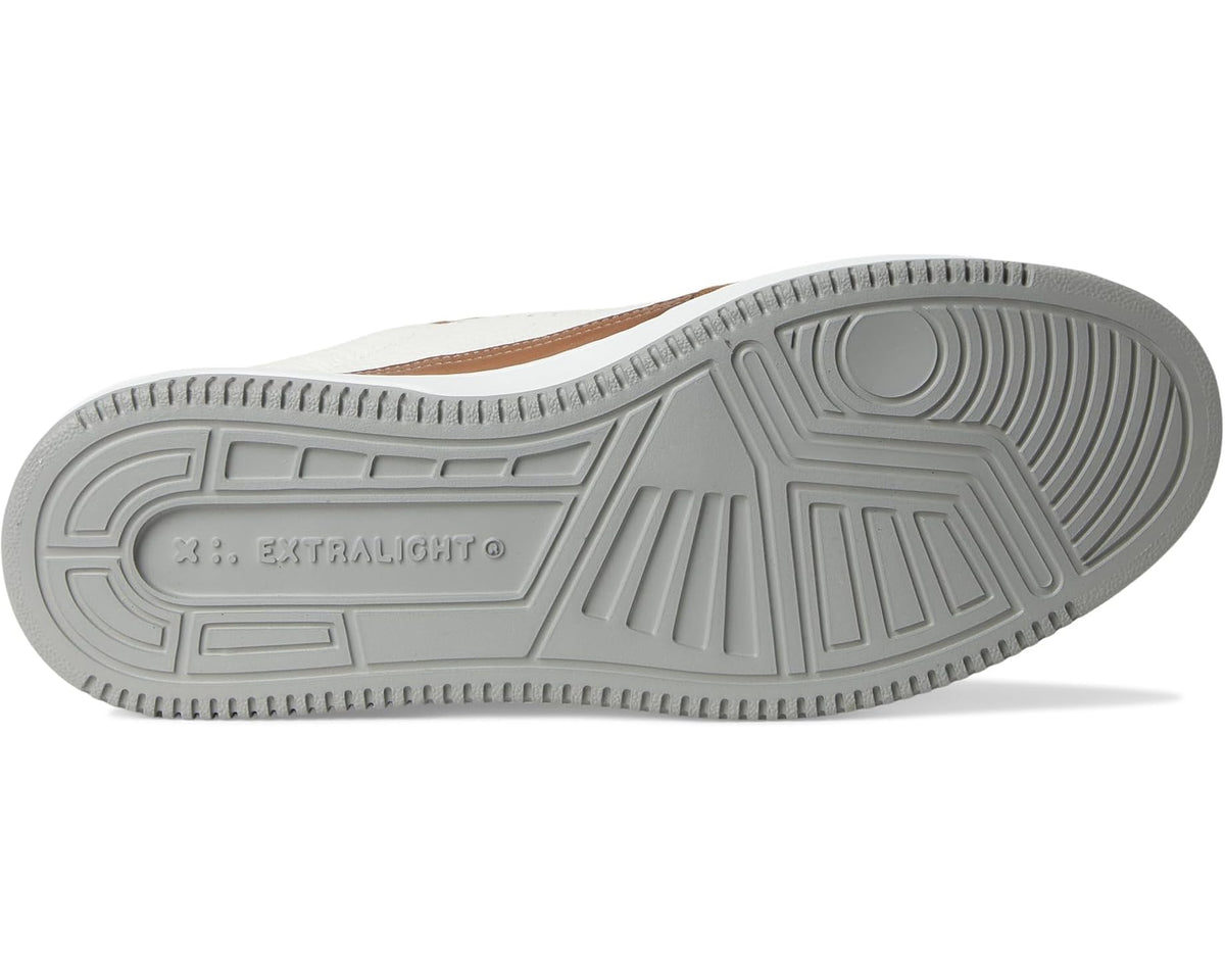 Men's Magnanni sneaker outsole with light gray rubber tread and sidewall grooves