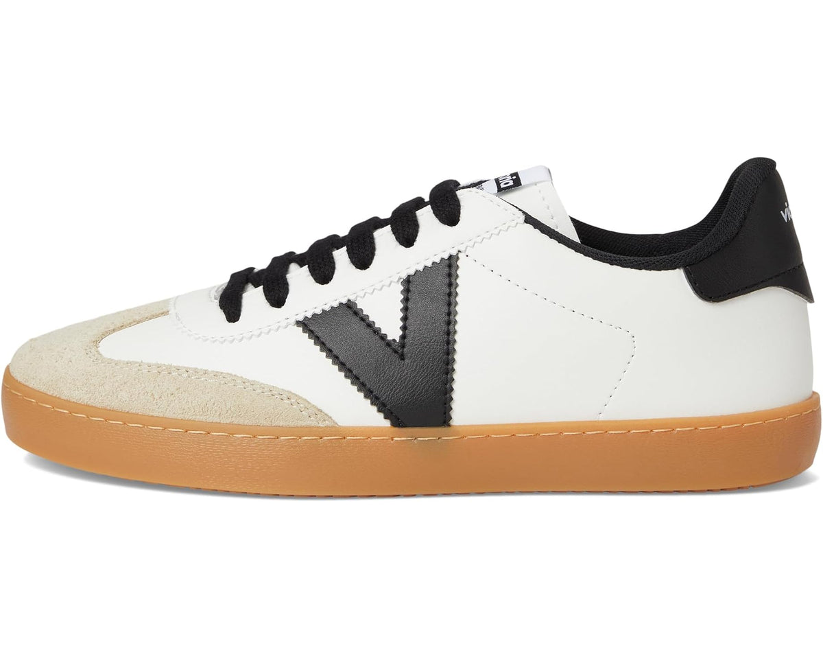Low-top sneakers with white leather, black side panel, beige suede accent, tan gum sole