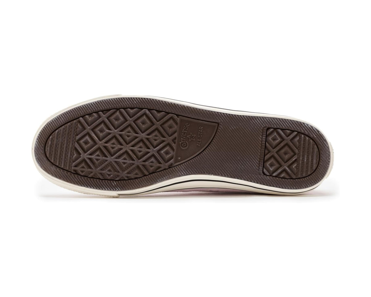 Rubber outsole for pink suede low-top sneaker with diamond tread pattern