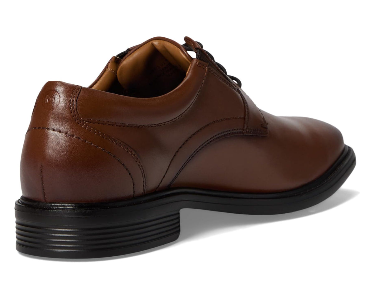 Brown leather lace-up oxford shoe with stitched heel detail and black sole
