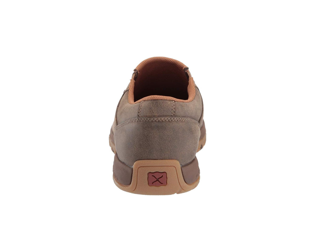 Men's suede slip-on moccasin shoe heel with logo patch and cushioned collar