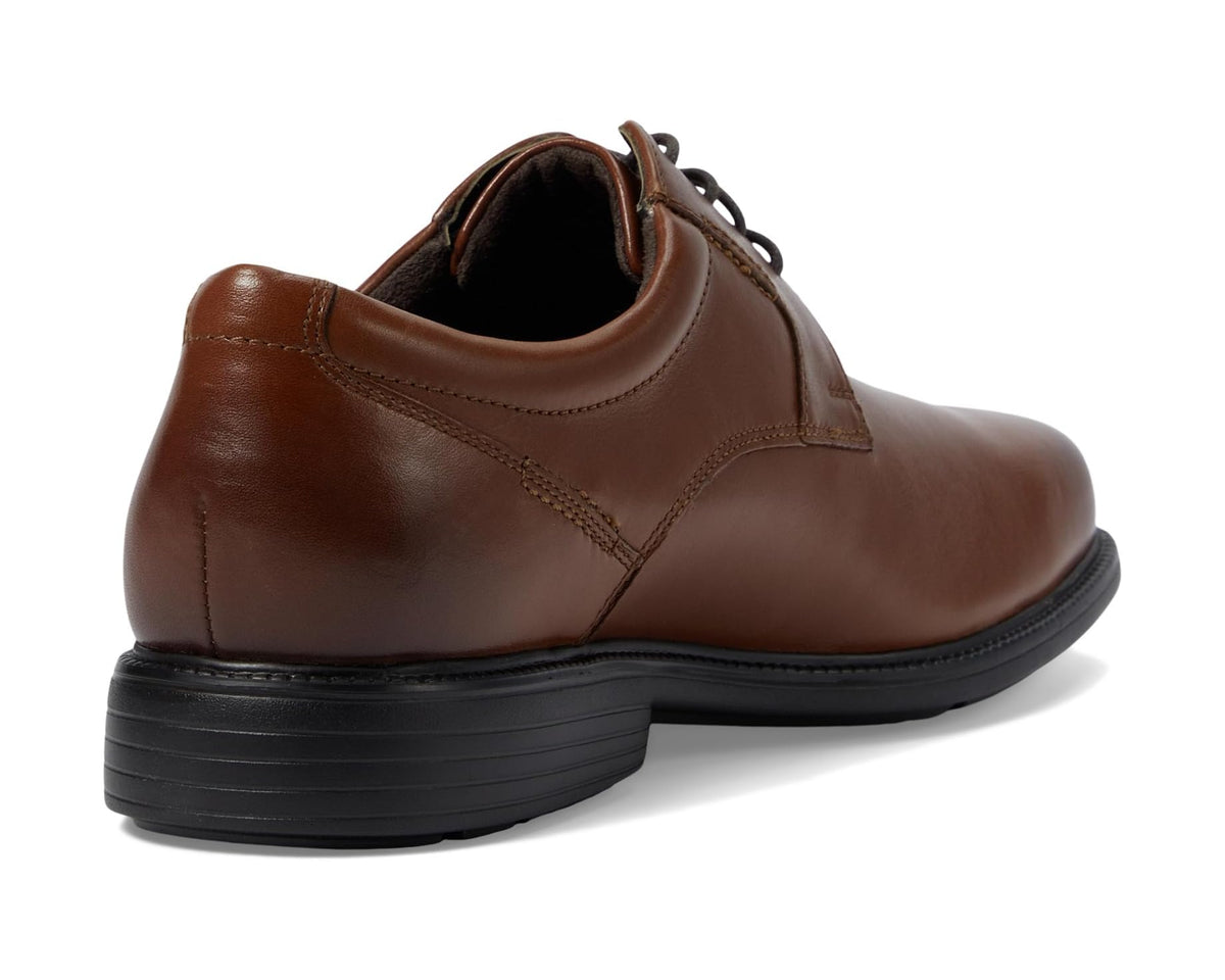 British tan Oxford shoe heel view with lace-up closure and padded collar