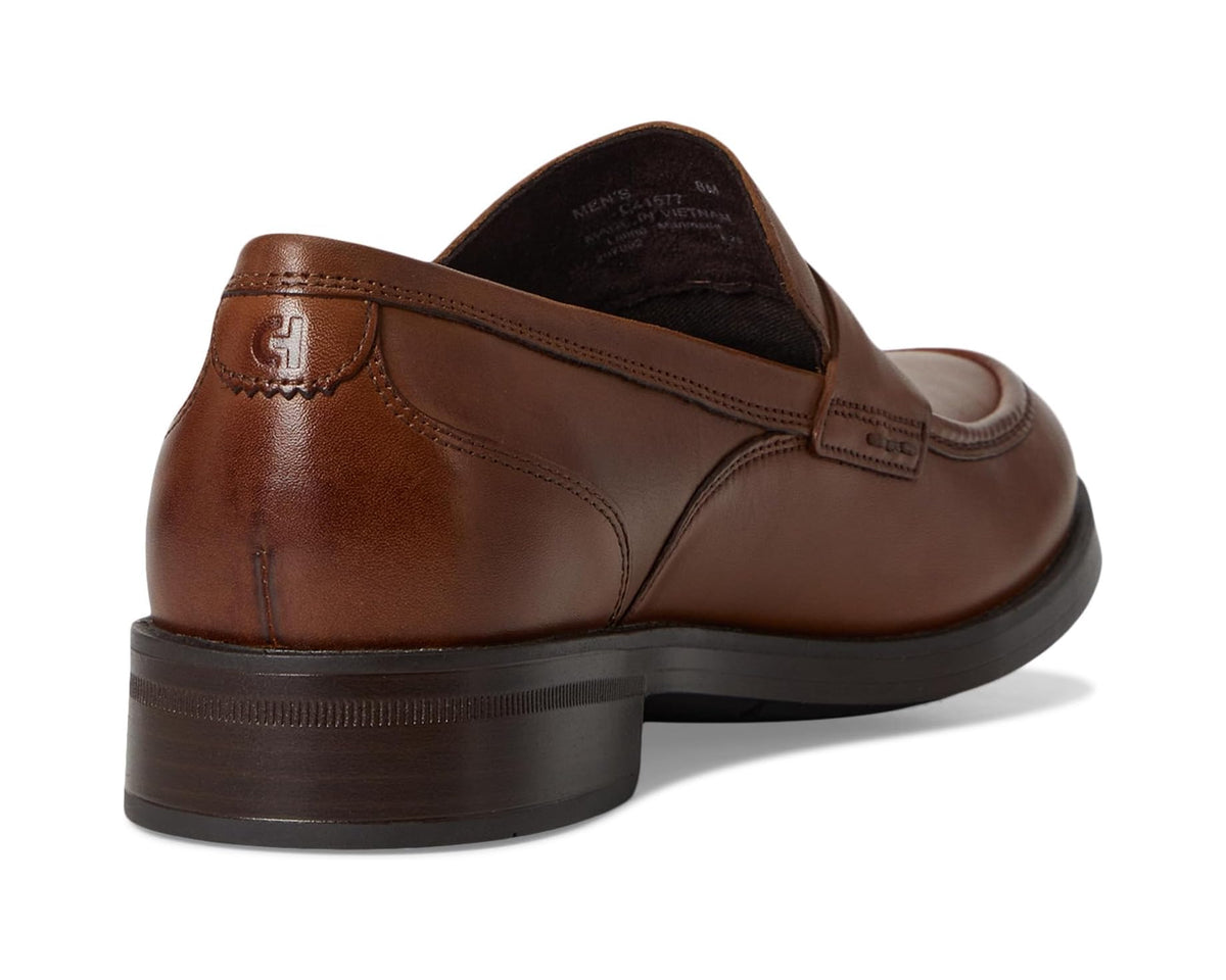 Men's brown leather penny loafers with heel tab and cushioned lining