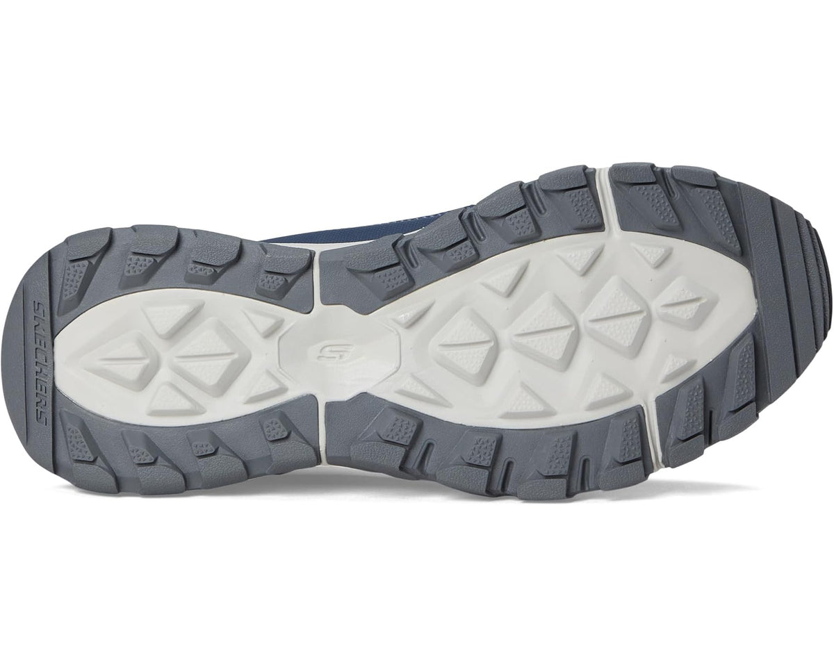 Navy and gray sneaker outsole with deep traction tread pattern