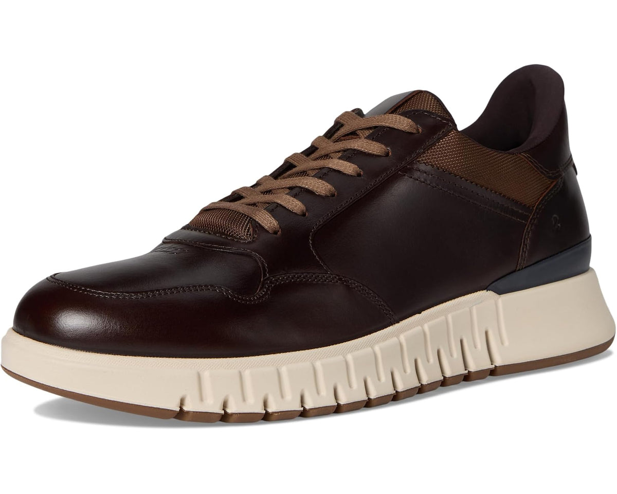 ECCO men's studio runner sneaker front angle in dark brown leather with lace-up closure