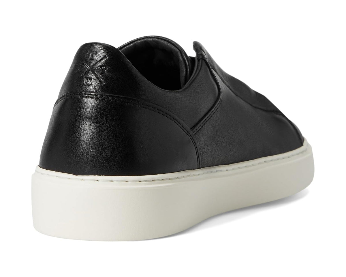Black leather sneaker heel with cushioned collar and thick white platform sole.