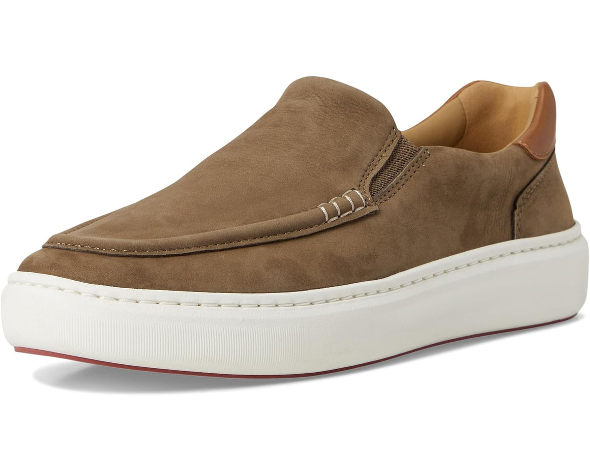 Taupe nubuck moc-toe slip-on shoe with stitched strap and white rubber sole profile