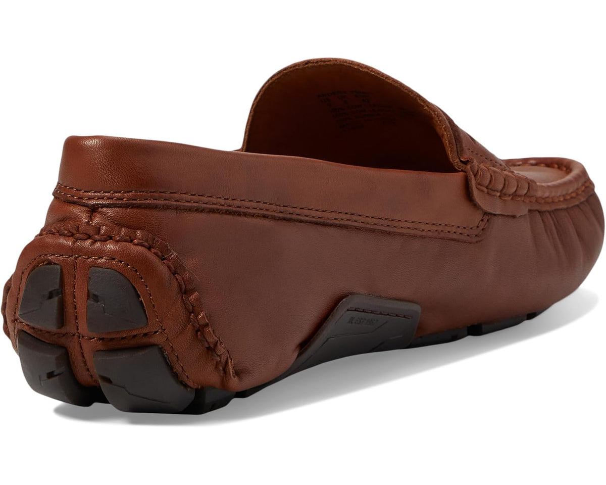 Brown penny loafer side and heel with stitched strap detail and rubber grip pods