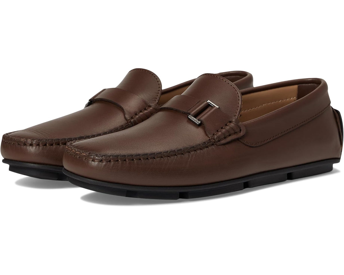 Brown leather slip-on loafer with buckle strap and stitched moc toe