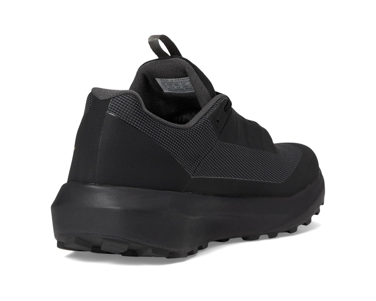 Black heel and rear collar of a lace-up trail running shoe with padding