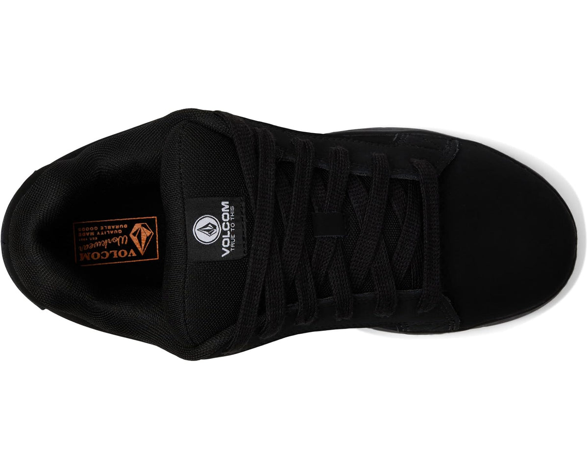 Black lace-up sneaker with mesh lining and Volcom label on heel