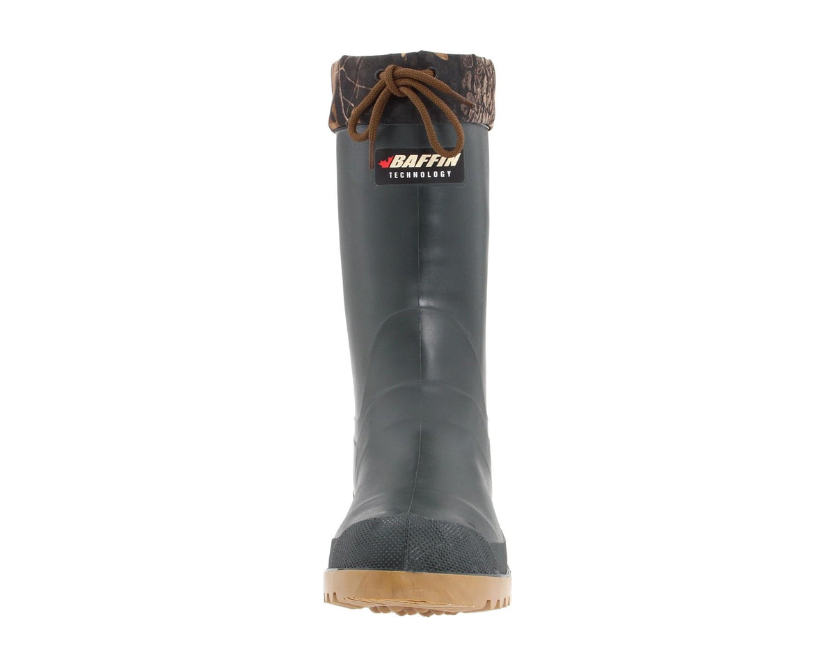 Men's Baffin traction boots with dark shaft, camouflage cuff, and tan outsole.