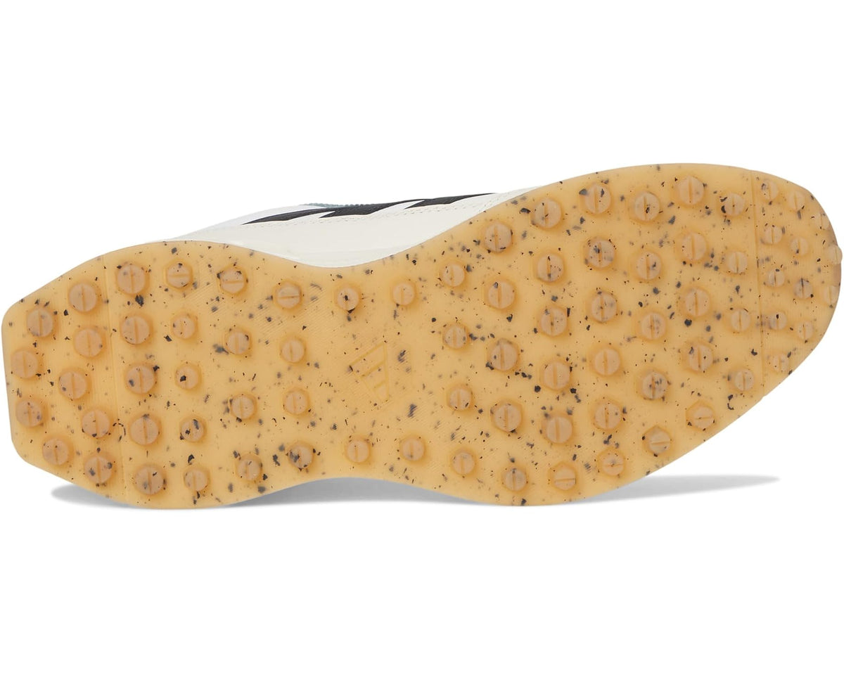 Men's adidas spikeless golf shoe outsole with tan rubber pod tread pattern