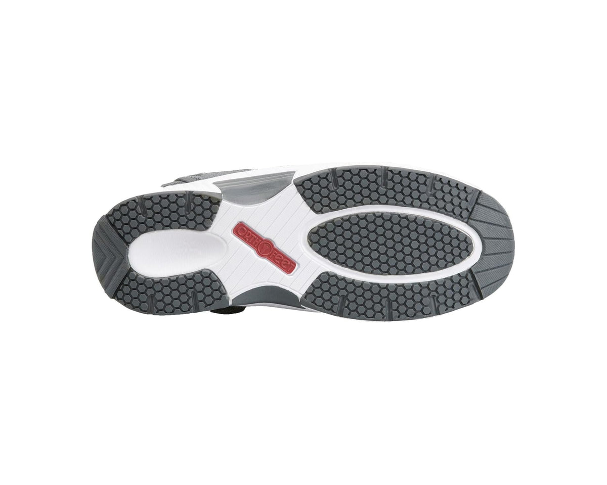 Grey athletic sneaker outsole with textured tread and white midsole, underside view