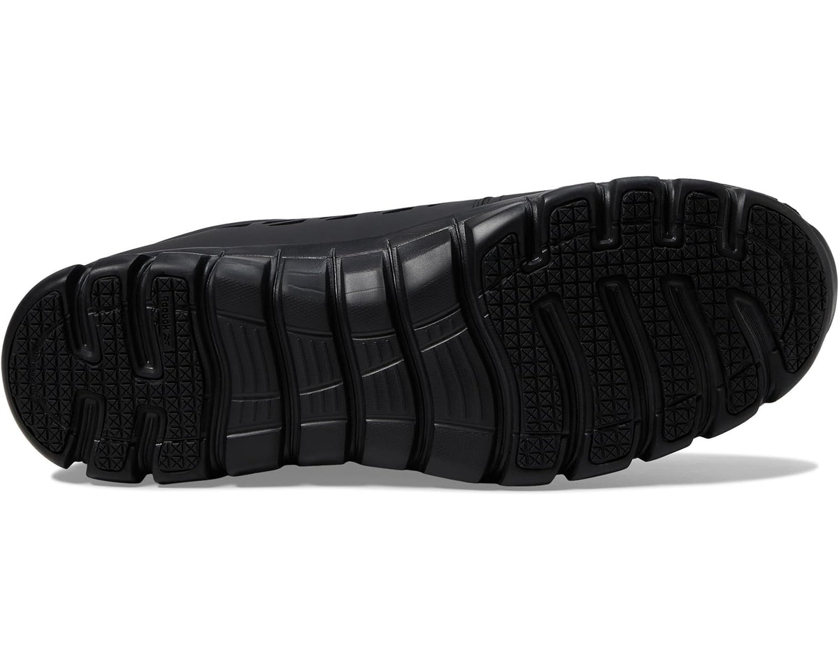 Men's Reebok black work sneaker outsole with deep tread and molded traction grooves