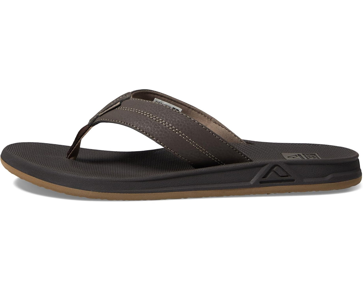 Men's brown slide flip-flops with logo patch and single thong strap.