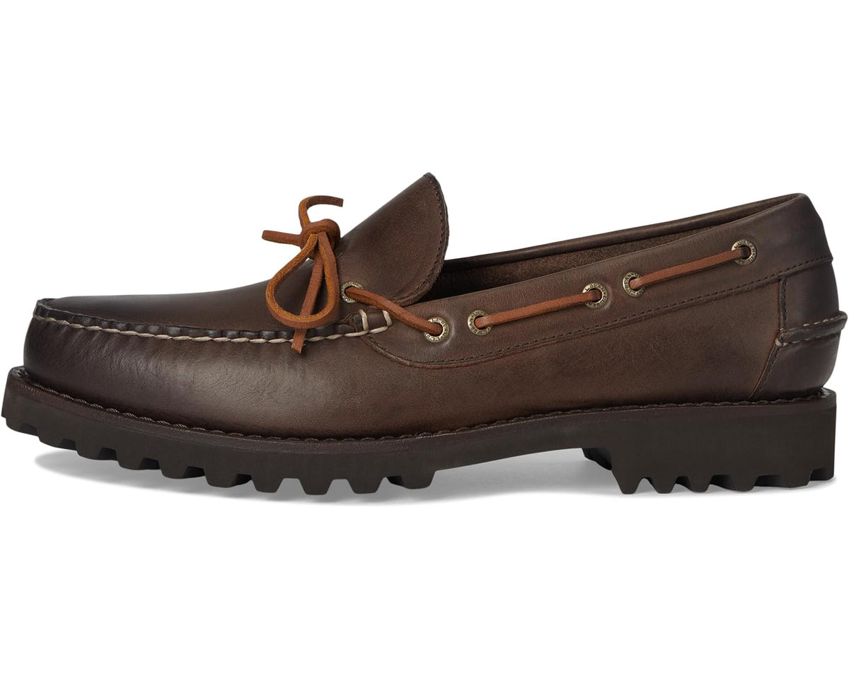 Dark brown leather boat shoe with tan lace-up eyelets and rugged rubber sole